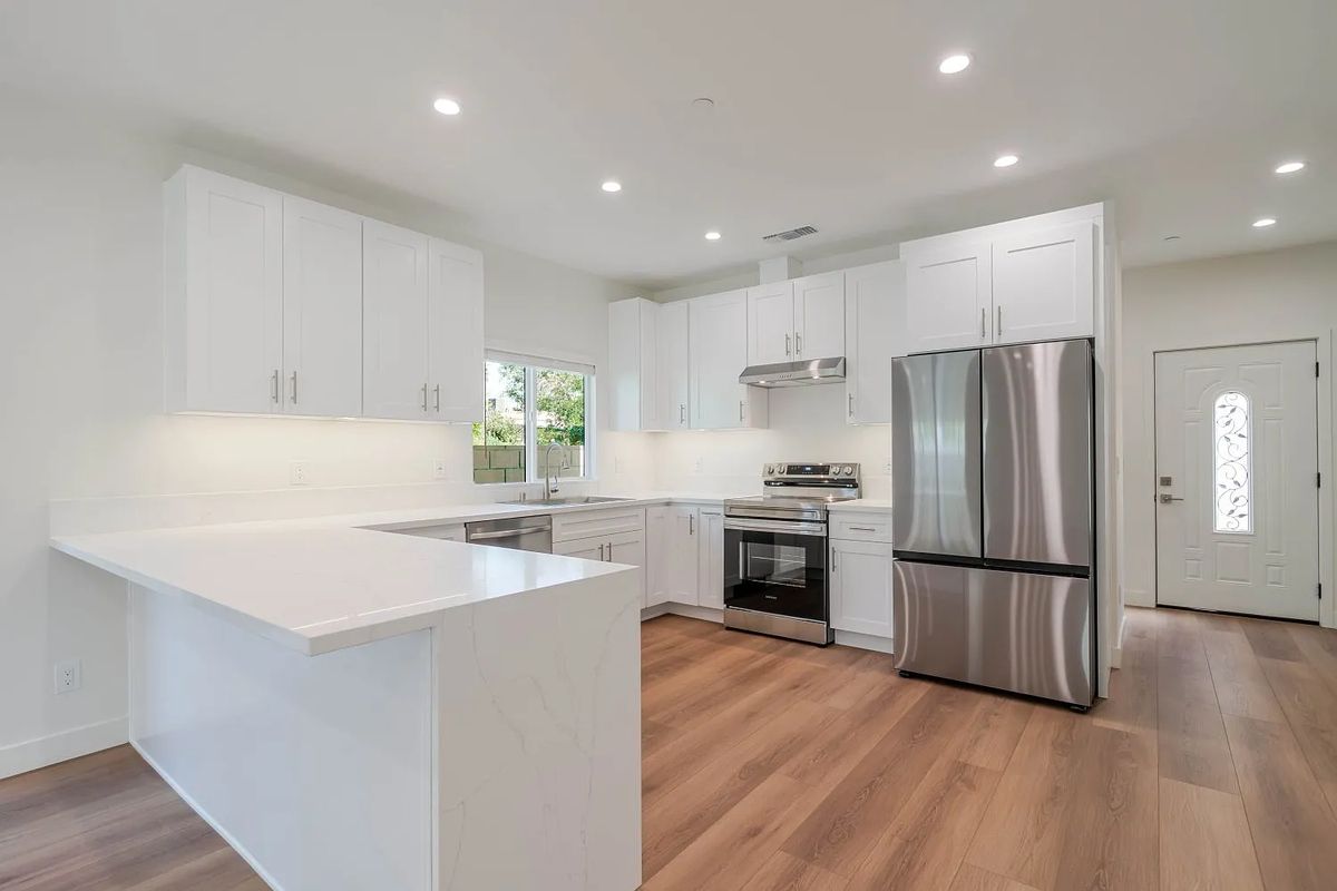 Finished white kitchen with recessed lighting at Redbank, Sun Valley